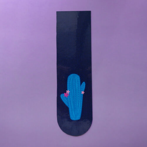 Teal cactus bookmark with small pink flowers on a dark navy blue background, featuring a rounded bottom edge.
