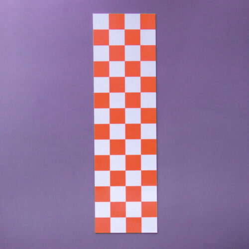 Bright orange and white checkered bookmark with a clean rectangular shape, displayed on a purple background.