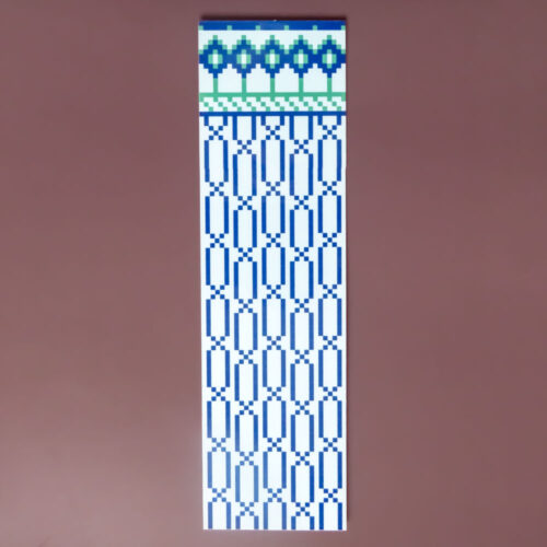 Bookmark with a top border of dark blue diamond motifs and long vertical geometric lines stretching downward, representing the pillars of faith that provide support.