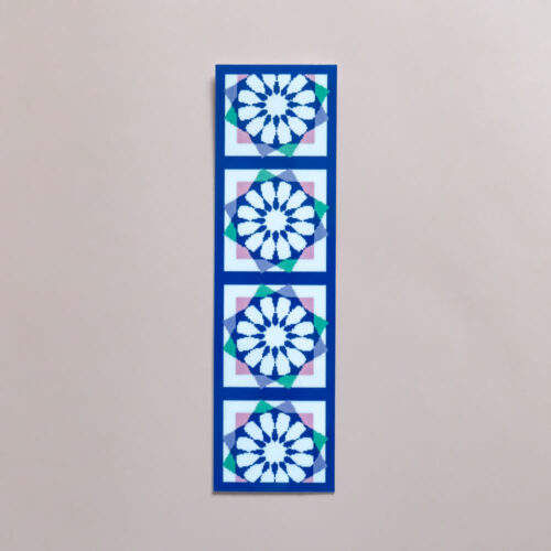 Bookmark with four square sections, each containing an intricate blue and purple geometric rosette.