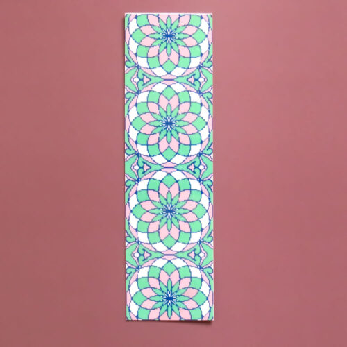 Bookmark featuring a vertical row of colorful, circular floral rosettes in shades of pink, teal, and white.